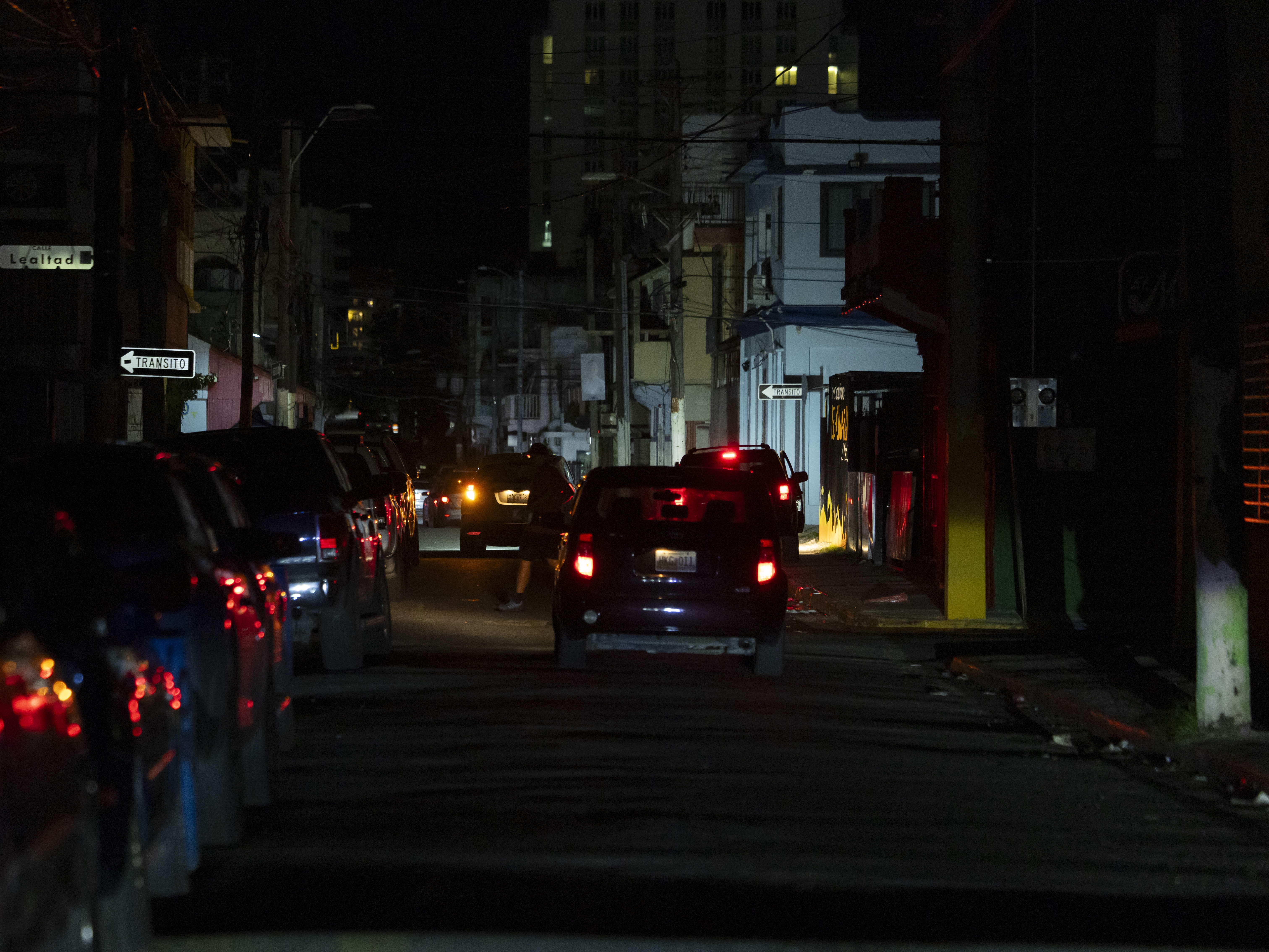 caption: A street is dark during a blackout in San Juan, Puerto Rico, after sunset on Tuesday.