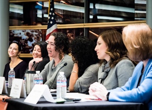 caption: 'Womxn Power Seattle' panel at Seattle's City Hall