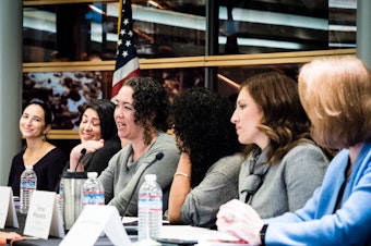 caption: 'Womxn Power Seattle' panel at Seattle's City Hall