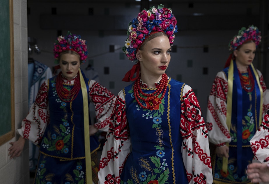 caption: Dariya Medynska gathers with other members of the Voloshky Ukrainian dance ensemble before the International Spring Festival at North Penn High School in Lansdale, Pennsylvania.