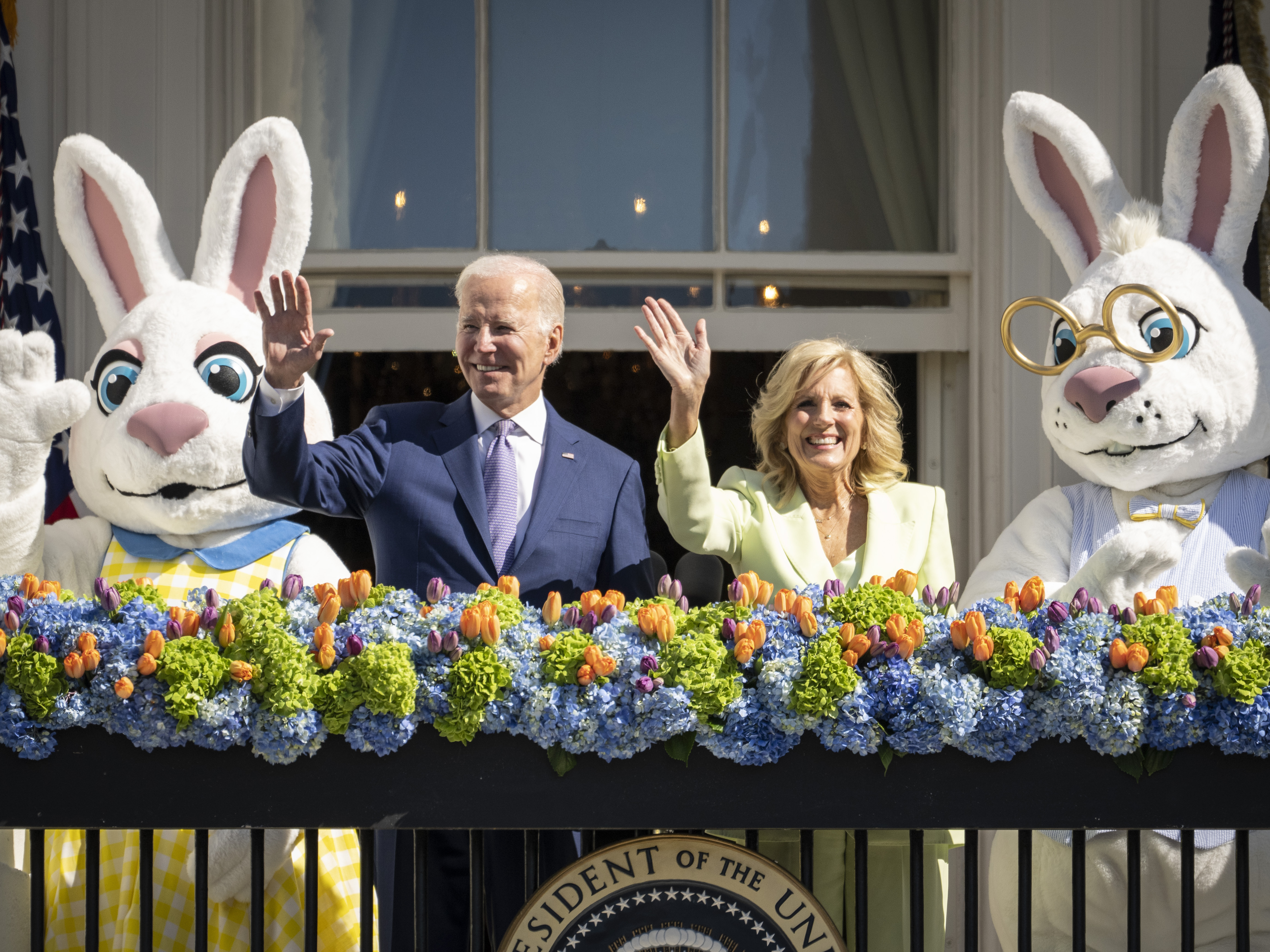 caption: President Biden and first lady Jill Biden attend the annual Easter egg roll on the South Lawn of the White House on April 10.