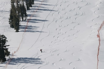 caption: In this photo provided by Mammoth Mountain Ski Area, a snowboarder rides in Mammoth Lakes, Calif., Sunday, May 5, 2024.