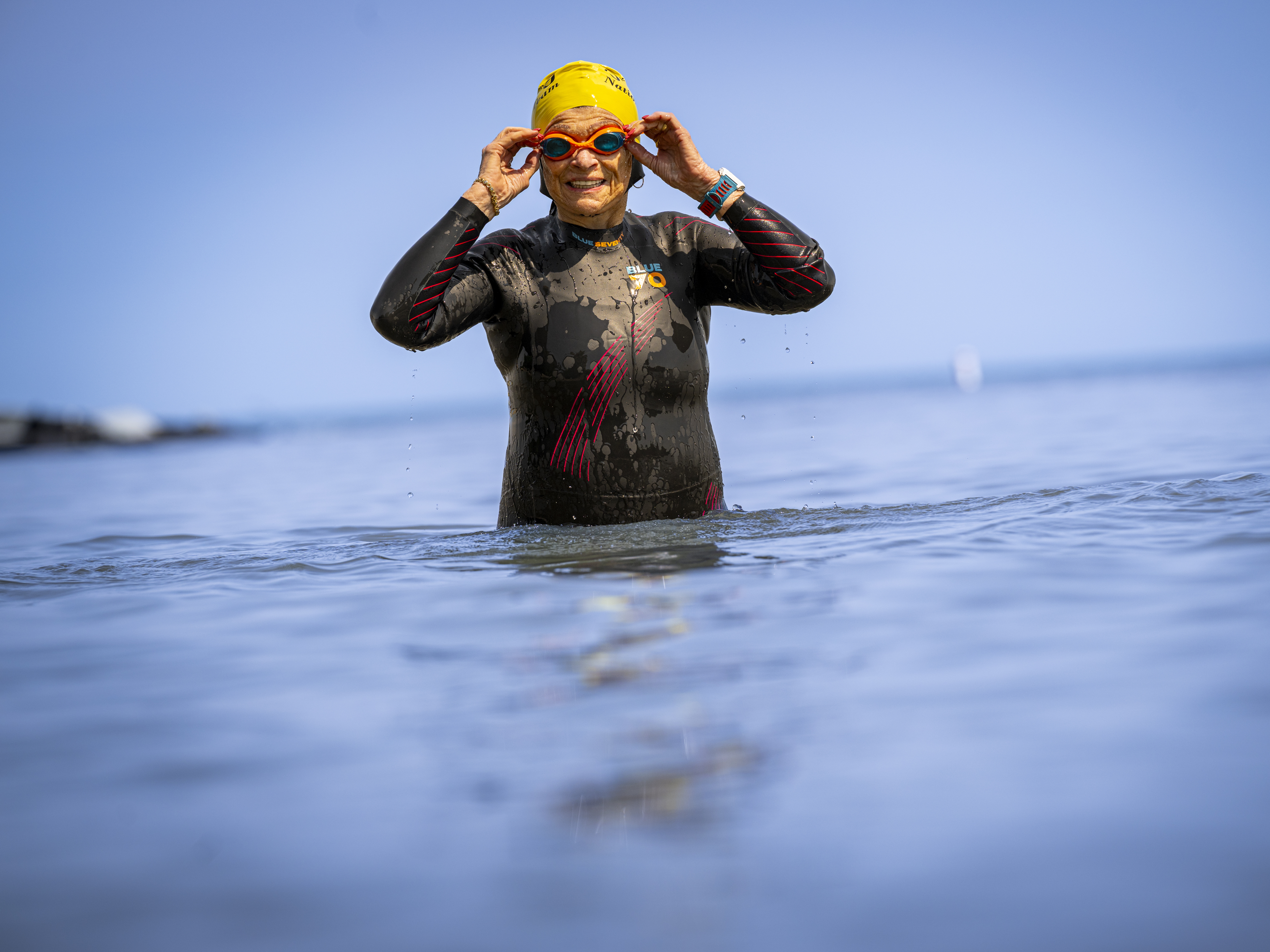 caption: Luise Easton has continued competing in triathlons into her 80s despite having issues with her heart.