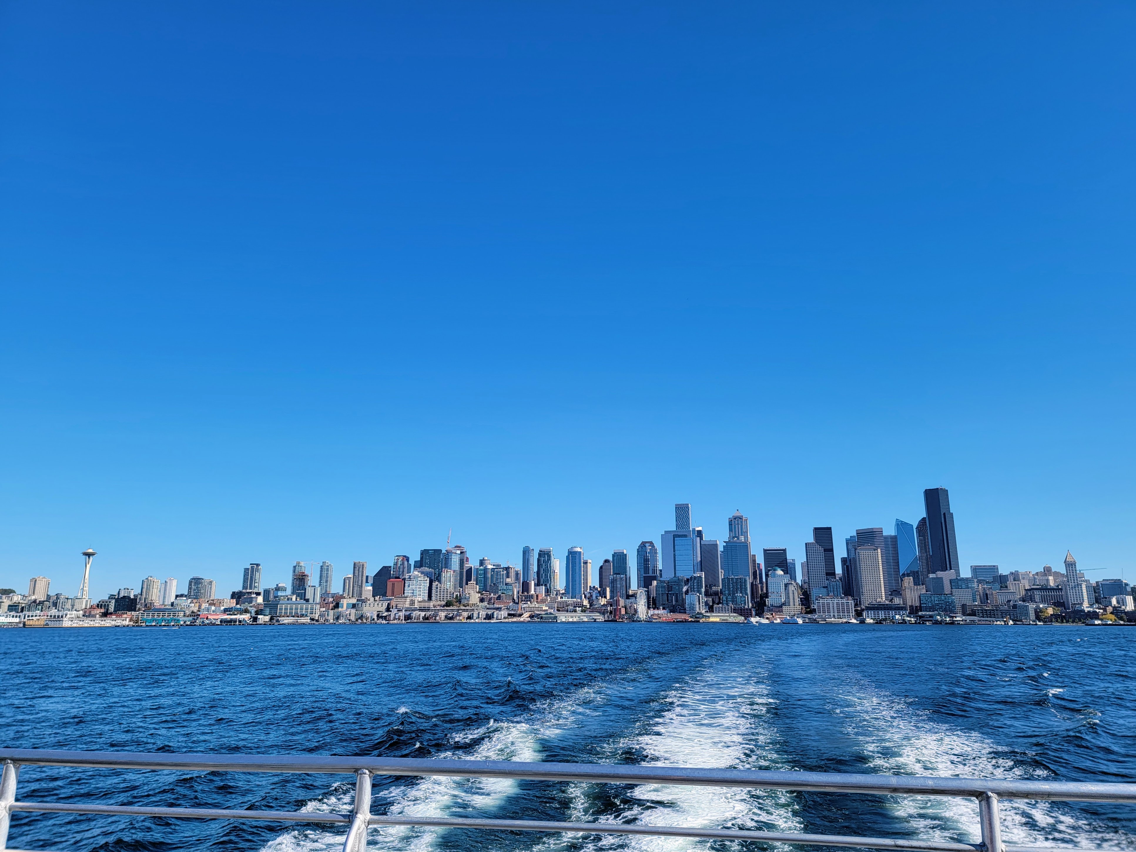 caption: A view of the downtown Seattle skyline seen from the West Seattle Water Taxi on Friday, Oct. 6, 2023.