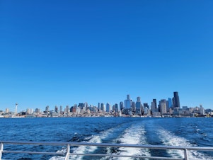 caption: A view of the downtown Seattle skyline seen from the West Seattle Water Taxi on Friday, Oct. 6, 2023.