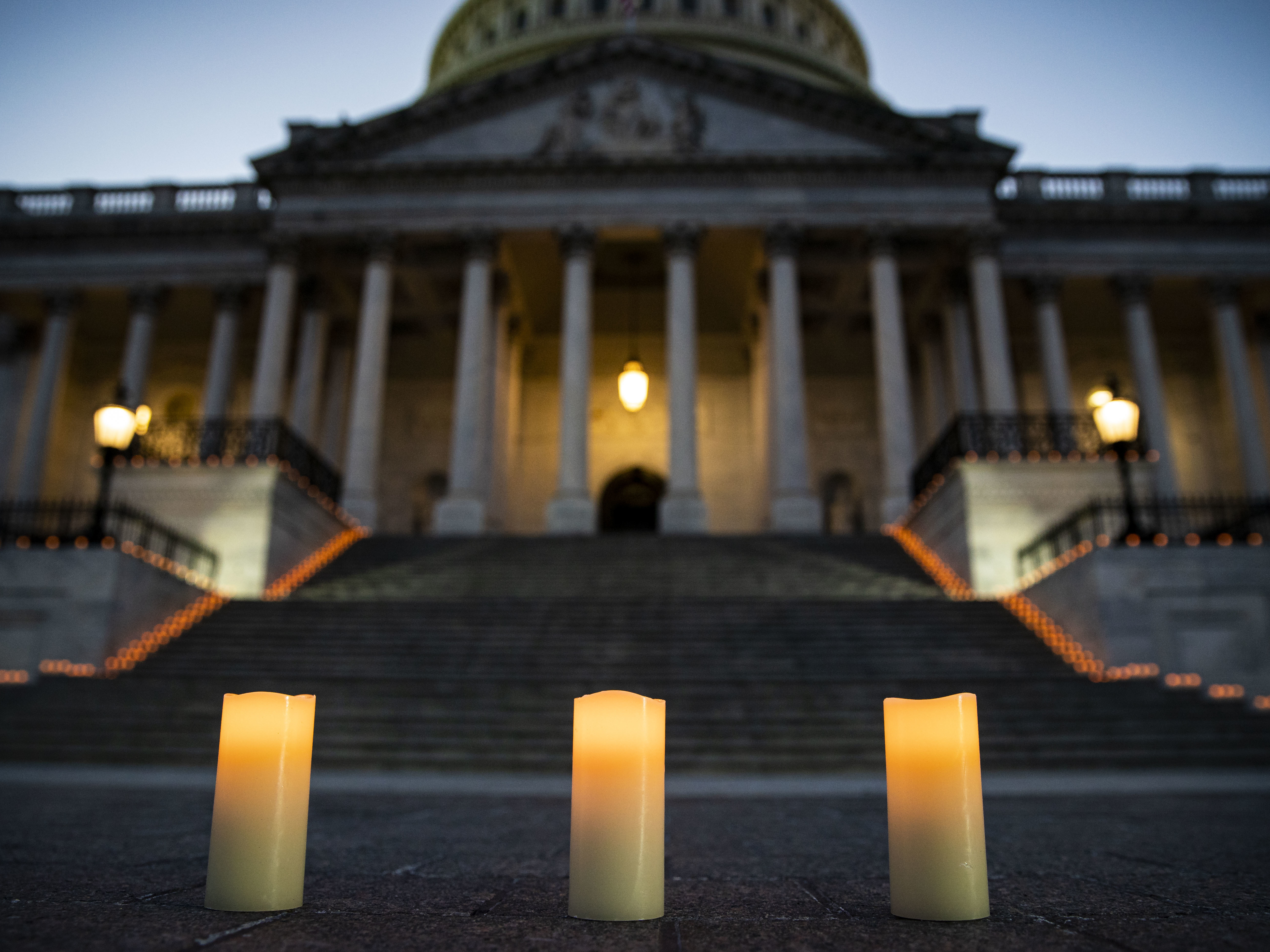 caption: Congressional leaders held a candlelight vigil outside the U.S. Capitol in Washington, D.C. on February 23, 2021 to mark the more than 500,000 U.S. deaths due to the COVID-19 pandemic. COVID-19 was the third leading underlying cause of death in 2020, according to a study published by the Centers for Disease Control and Prevention on Wednesday.