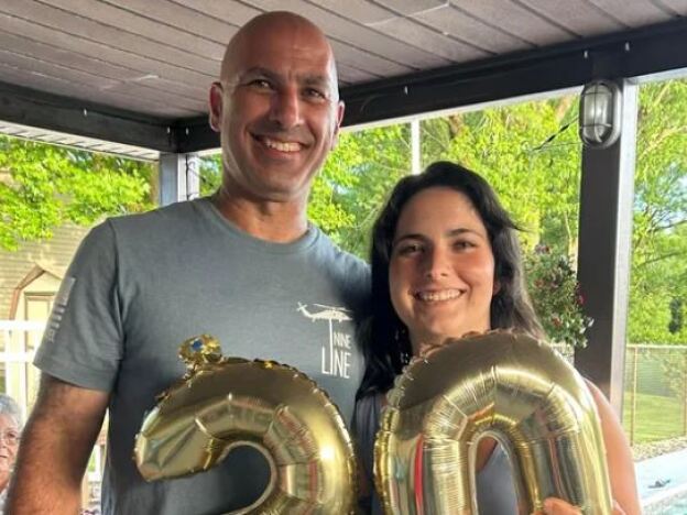 caption:  Corey Comperatore poses in a photo from a GoFundMe page dedicated to his daughter Allyson in the aftermath of his death. The GoFundMe has raised more than $400,000 so far.