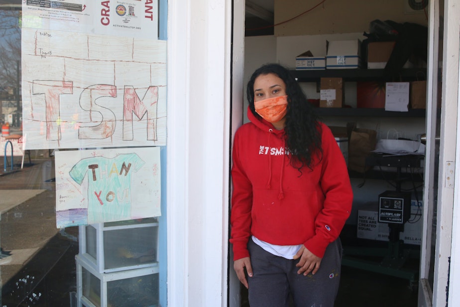 caption: Crystal TJ at The T-Shirt Men, a screenprinting shop on MLK in Tacoma's Hilltop neighborhood.