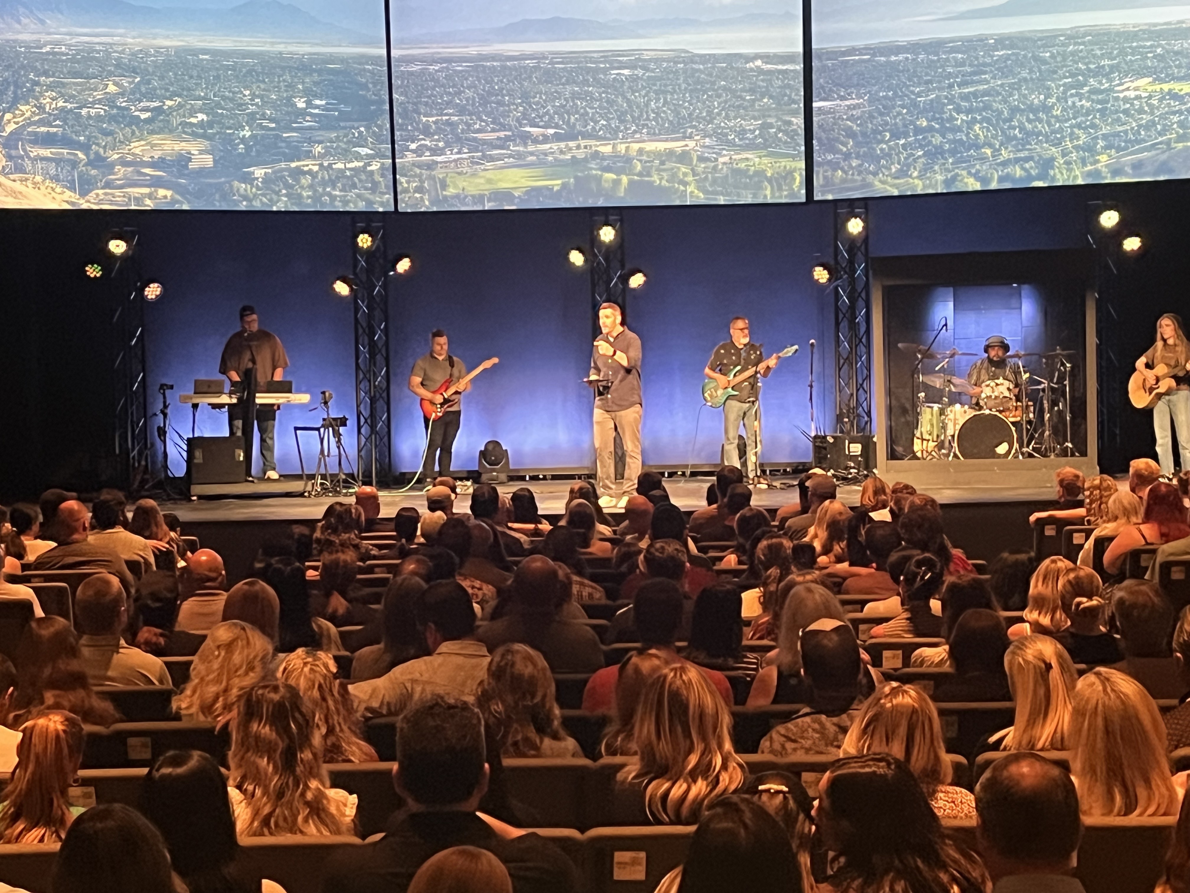 caption: At CenterPoint Church in Orem, Utah, pastor Mike Smith told congregants, "This is not the kind of thing that we get to acknowledge on one Sunday and move on. In fact, we're going to be navigating this as a community and as a church family for weeks and months to come."