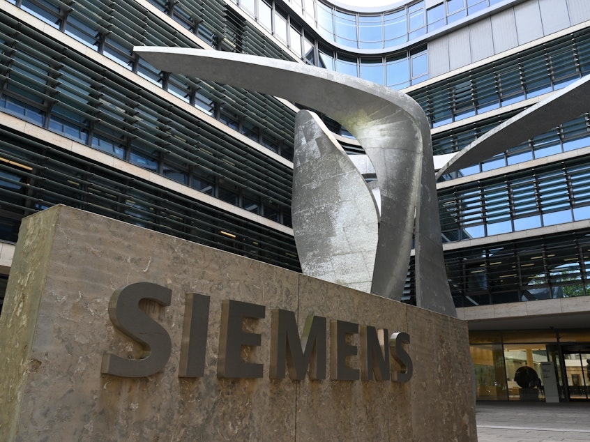 caption: Siemens headquarters in Munich, Germany, pictured in May 2019. The German industrial giant is ending operations in Russia after more than a century.