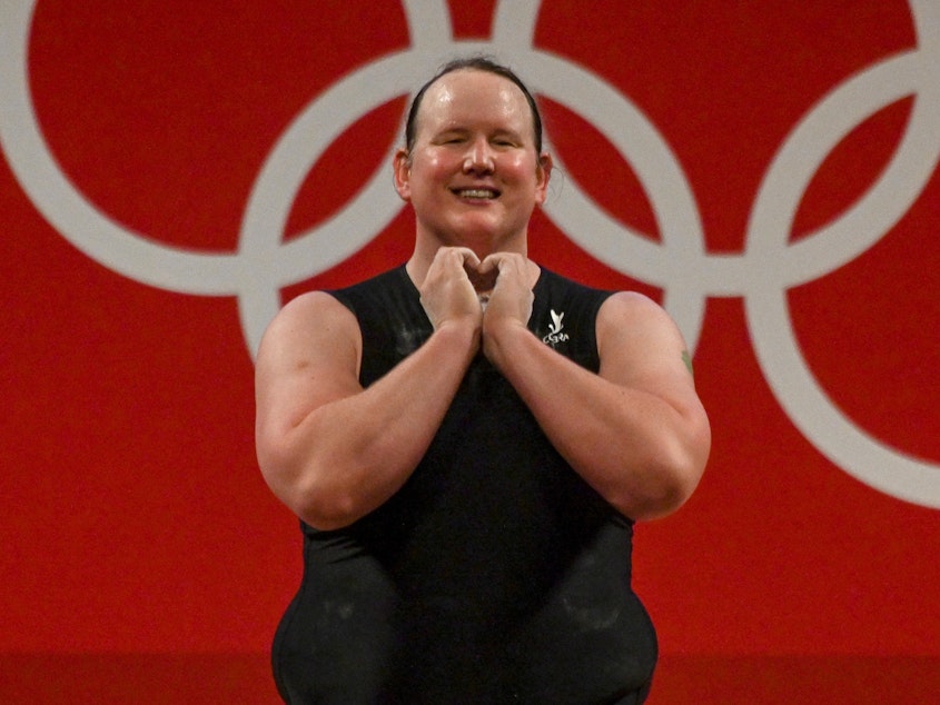 caption: After making history Monday, weightlifter Laurel Hubbard thanked the International Olympic Committee "for living up to the Olympic values and showing that sport is for all and that weightlifting can be done by all types of people."