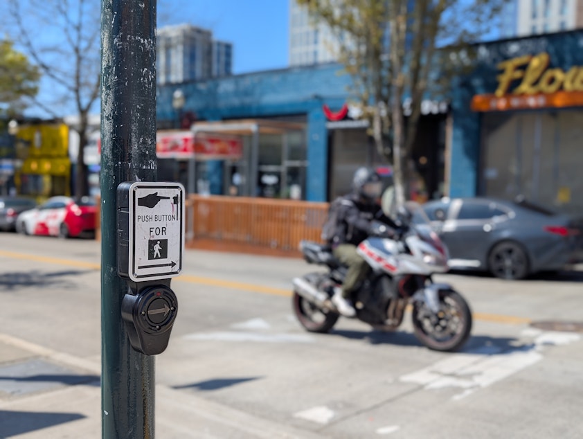 caption: Crosswalk speakers at the corner of 43rd street and University Ave were hacked to play an audio deepfake of Amazon founder Jeff Bezos.