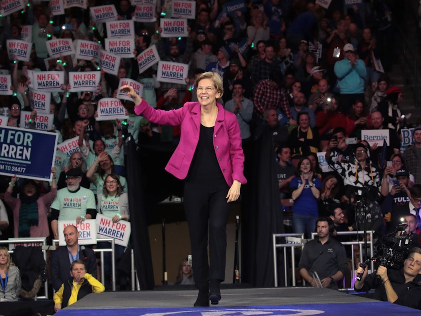 caption: On the presidential campaign trail, Sen. Elizabeth Warren became known as the "woman with the plan."