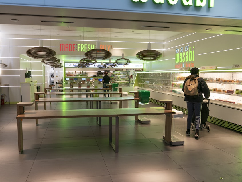 caption: Food businesses are being urged to serve only take-out orders to reduce the spread of the novel coronavirus. Photo taken at the Wasabi Store in Penn Station in New York, Monday, March 16th, 2020.