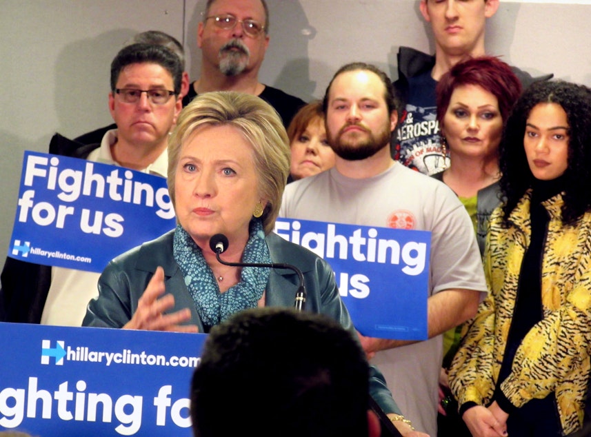 caption: Hillary Clinton makes her case at the Boeing Machinists union hall in Everett on Tuesday afternoon.