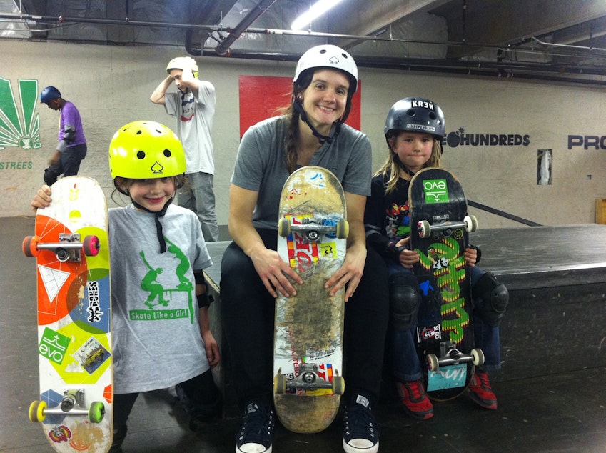 caption: Emma, 7, Skate Like A Girl's Seattle program director Kristin Ebeling, 25, and Maya, 6.