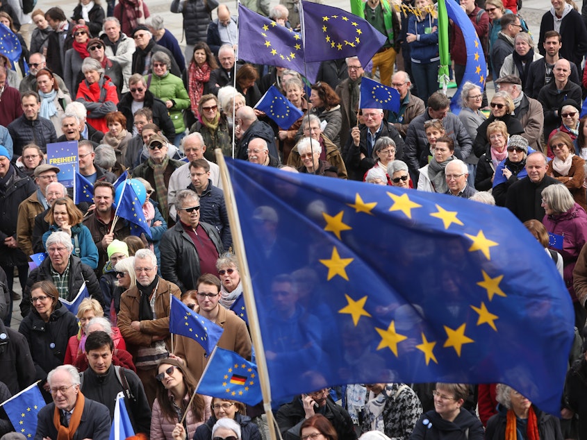 caption: Pro-European Union demonstrators march in Berlin on March 31.