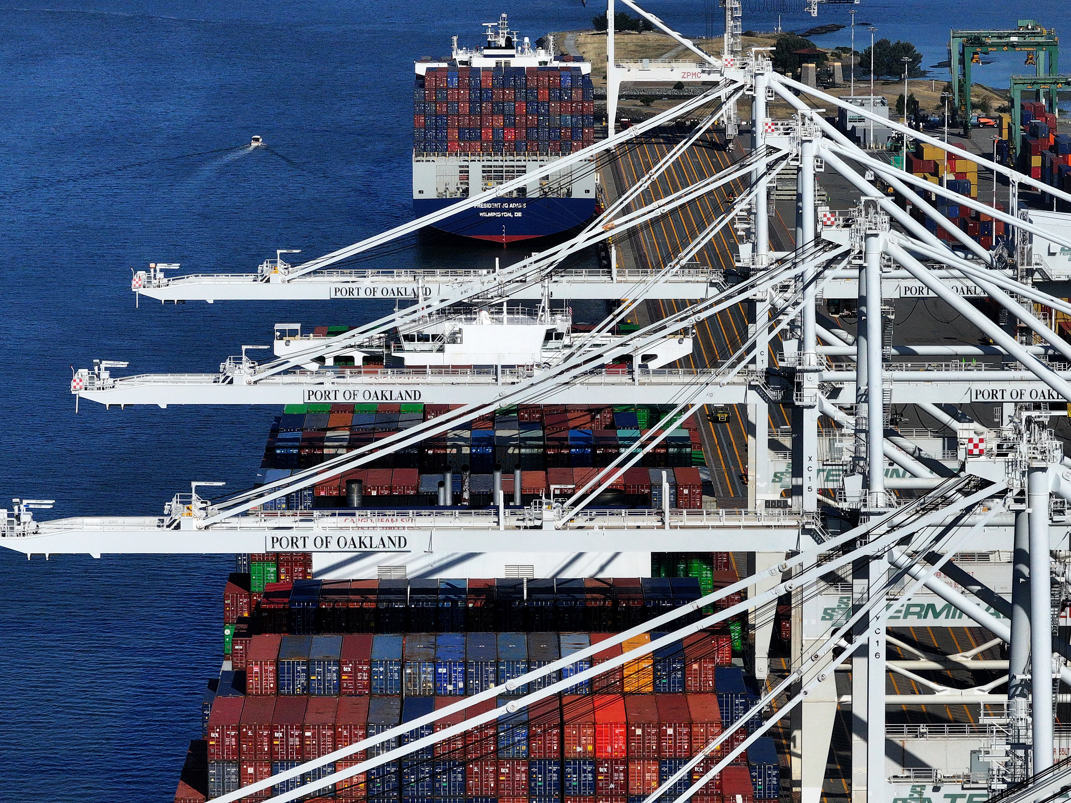 caption: Cargo traffic at the Port of Oakland has slowed since President Trump imposed worldwide tariffs in April.