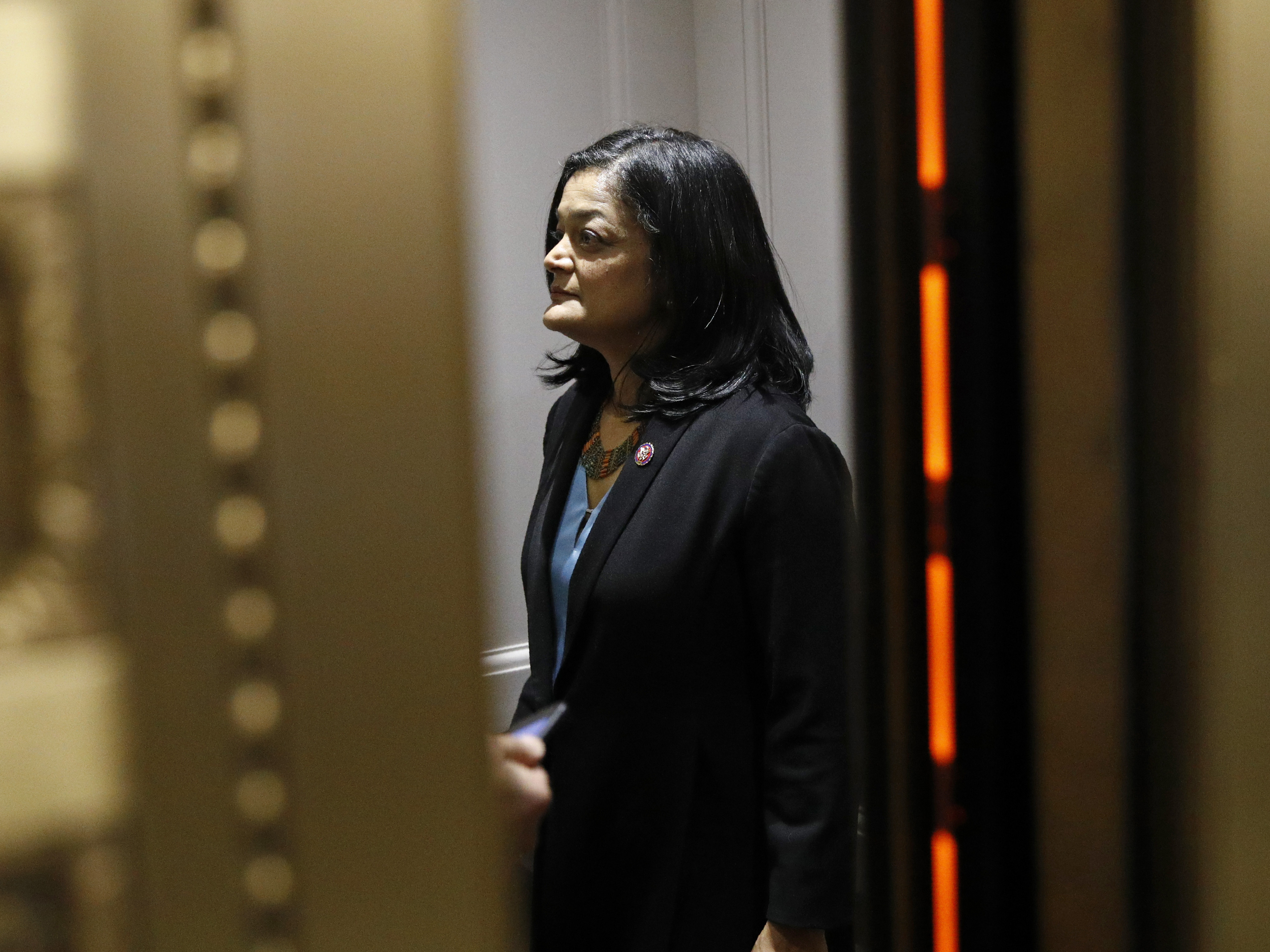 caption: "You know, it's like a gut punch to millions of people," Washington Rep. Pramila Jayapal, who chairs the House Progressive Caucus, said about the $15-an-hour minimum wage coming out of President Biden's COVID-19 relief package. But, she says her vote will be based on the bill as a whole, even though it doesn't include the wage hike.