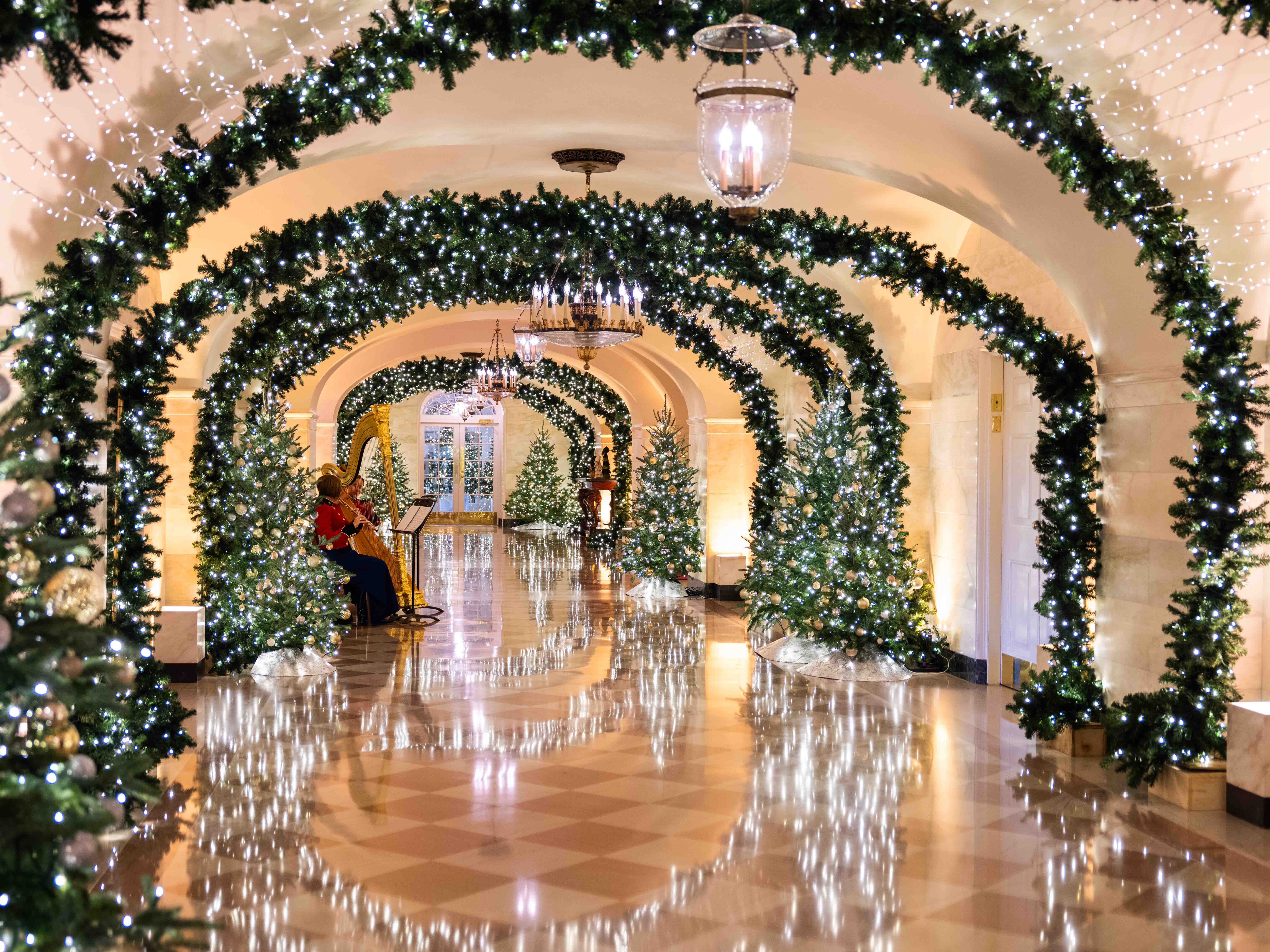 caption: Musicians perform in the East Colonnade of the White House in Washington, D.C, Monday, Dec. 2, 2024