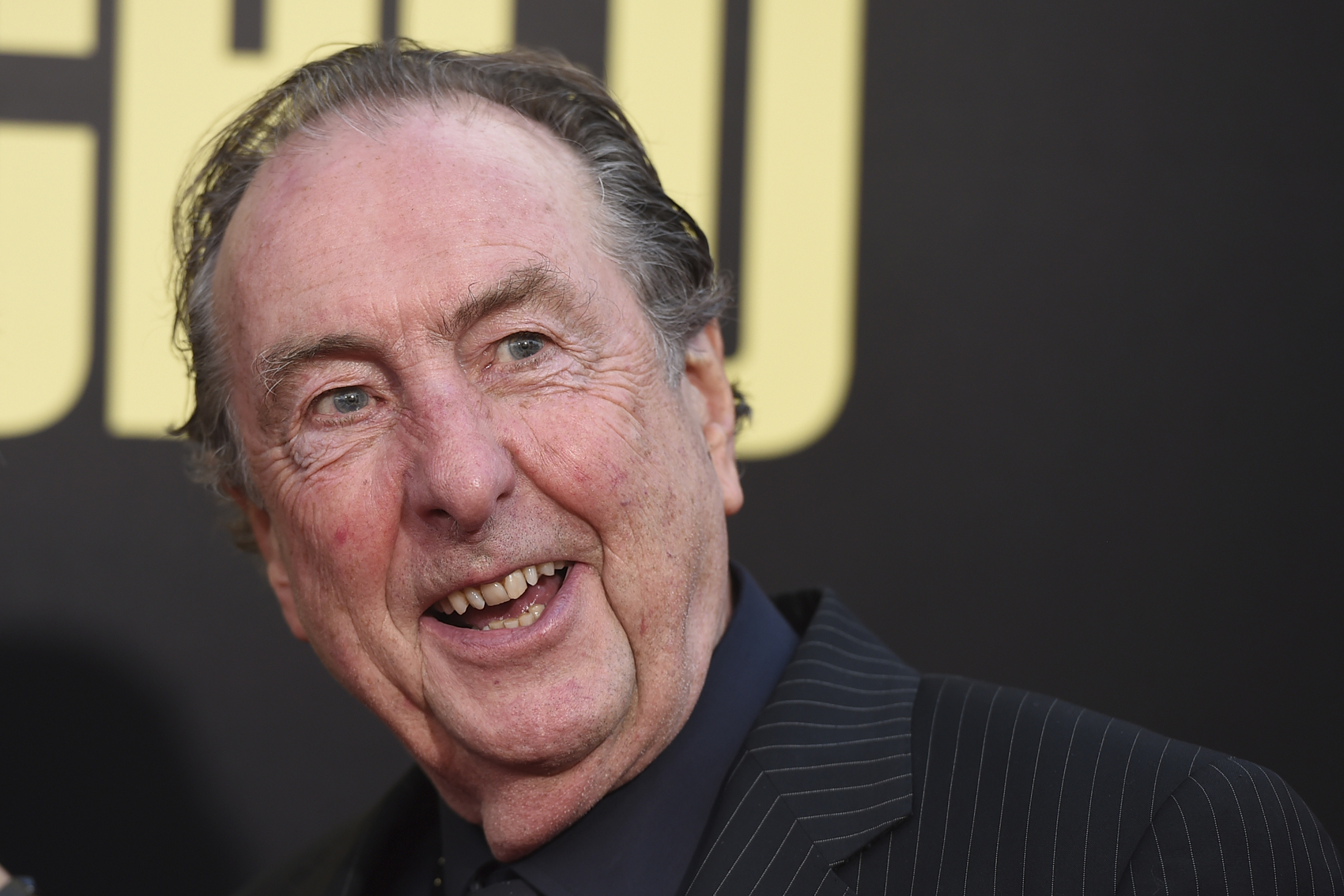 caption: Eric Idle arrives at the Los Angeles premiere of "Snatched" at the Regency Village Theater on Wednesday, May 10, 2017. (Jordan Strauss/Invision/AP)