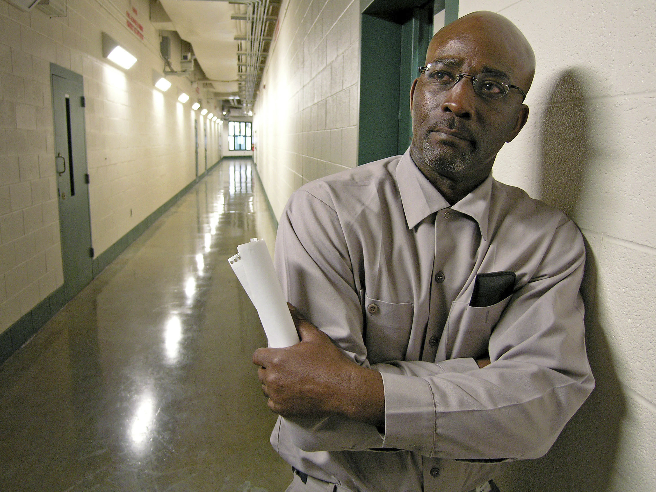 caption: Ronnie Long stands in a hallway at the Albemarle Correctional Institution in Albemarle, east of Charlotte, N.C., in 2007.
