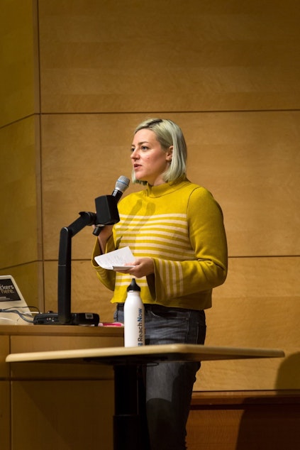 caption: Candace Faber speaking at a technology event at the University of Washington in 2017.