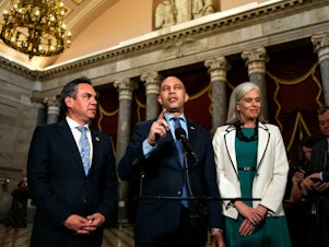 caption: House Democratic Caucus Chair Pete Aguilar of California, House Minority Leader Hakeem Jeffries of New York and House Minority Whip Katherine Clark of Massachusetts speak during a news conference at the U.S. Capitol on Wednesday.