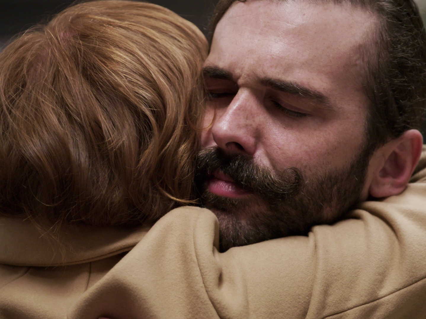 caption: Jonathan Van Ness embraces a participant on Season 4 of <em>Queer Eye</em>. Following the success of the reboot, Netflix has made kindness a key element of its unscripted and competition programming.