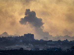 caption: This picture taken from a position in southern Israel near the border with the Gaza Strip shows smoke billowing in the the Palestinian territory after an Israeli strike on November 21, 2023, amid ongoing battles between Israel and the Palestinian Hamas movement.