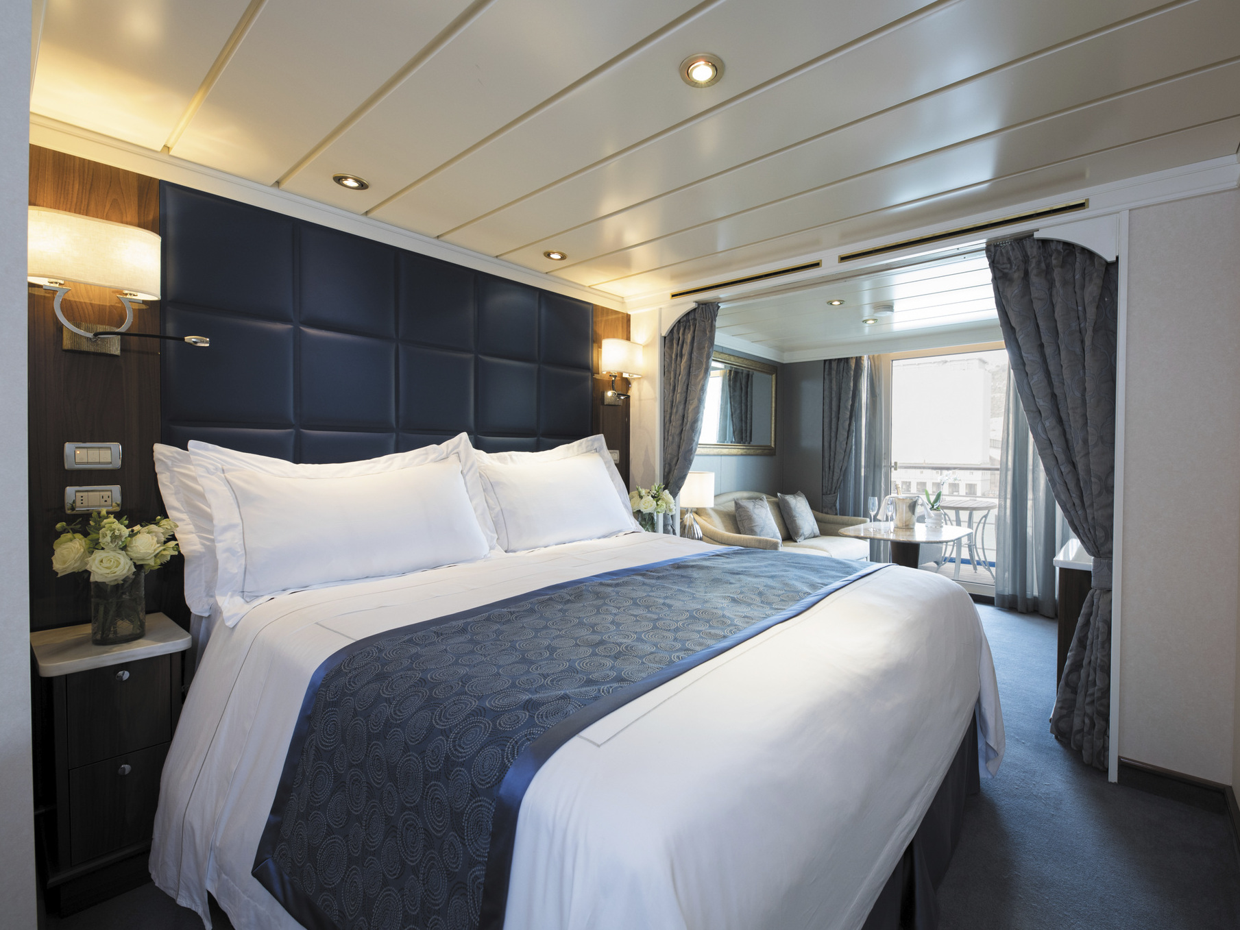 caption: Home away from home: Passengers on the Seven Seas Mariner will sail around the world in a "deluxe veranda suite" — a voyage that will last more than four months.