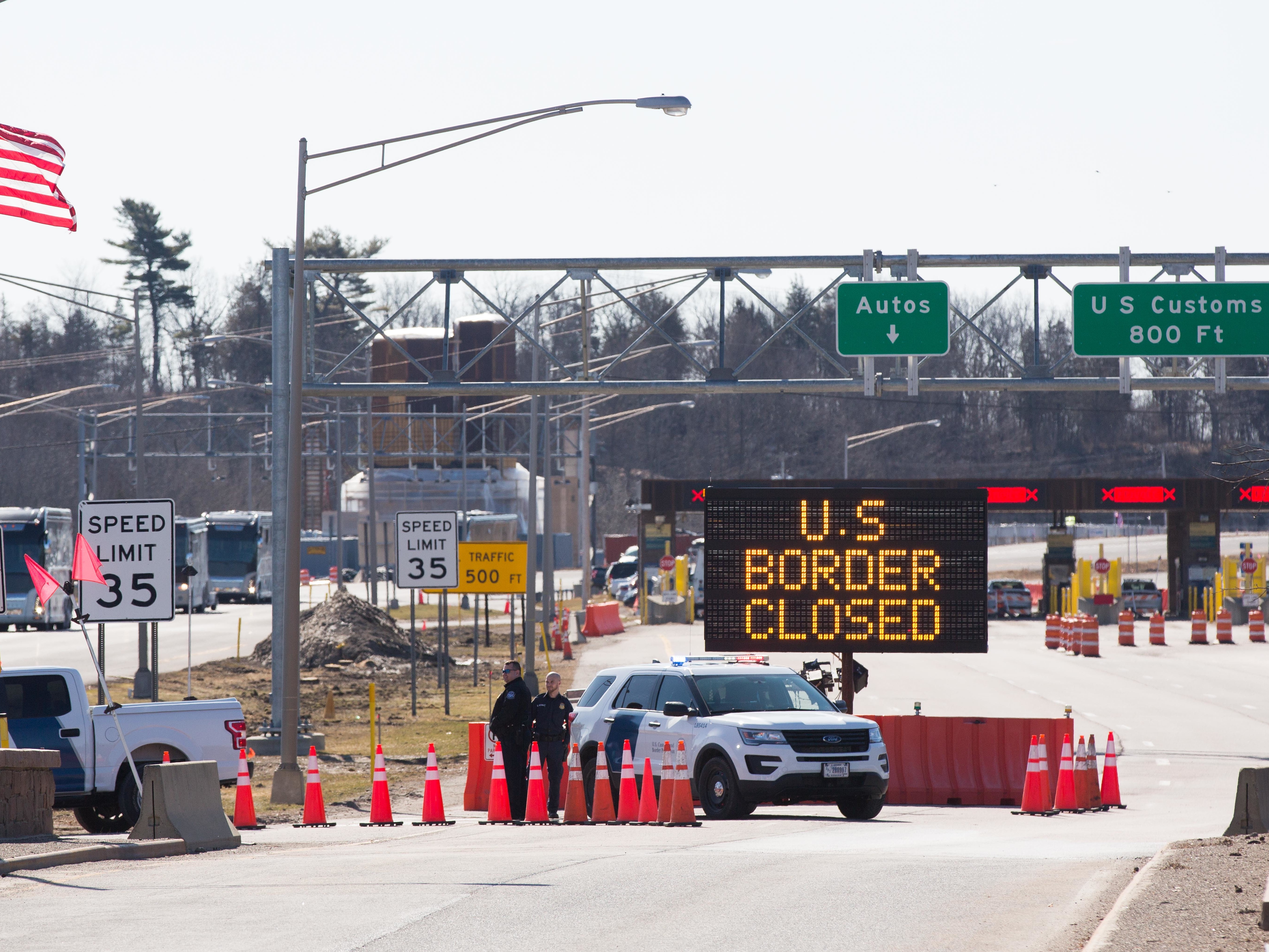 caption: In March, the United States agreed with Mexico and Canada to restrict nonessential travel because of the coronavirus outbreak.