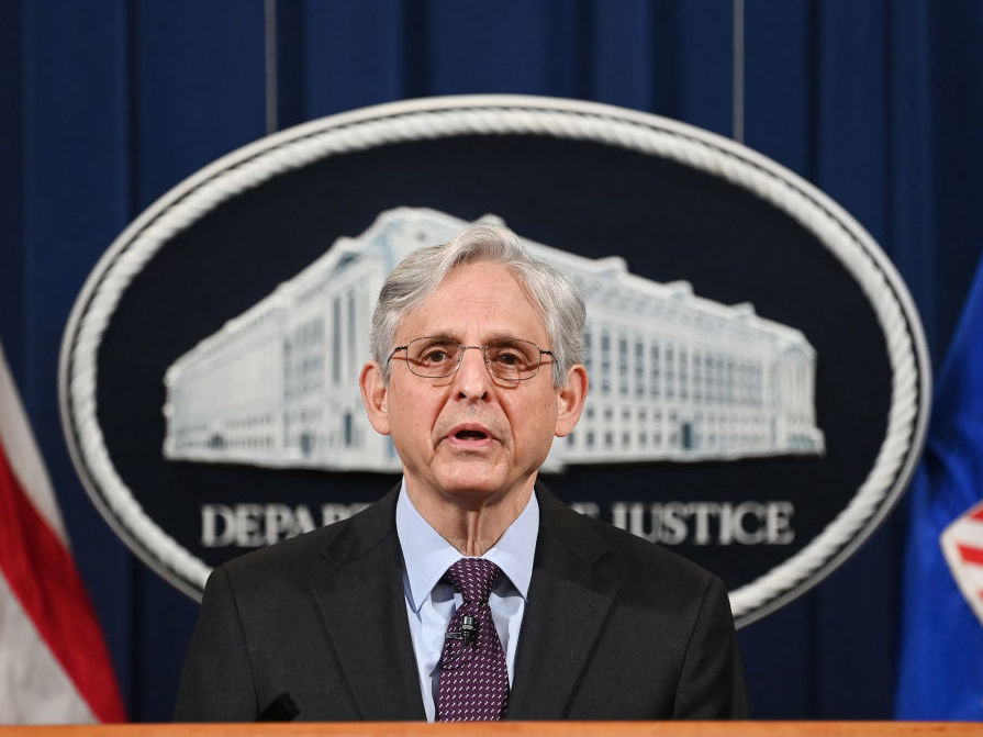 caption: Attorney General Merrick Garland speaks at the Department of Justice on April 26.