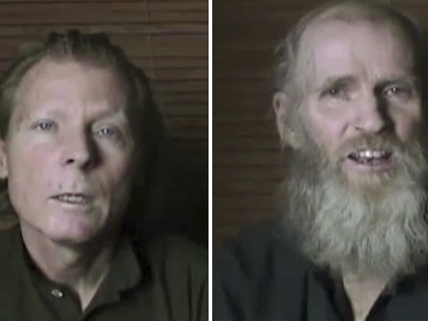 caption: Australian Timothy Weeks, (left), and American Kevin King were abducted by insurgents in Kabul in August 2016. They are seen here in video stills released by the Taliban in June 2017.