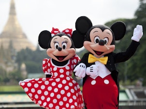 Walt Disney characters Mickey Mouse and Minnie Mouse pose for photographs