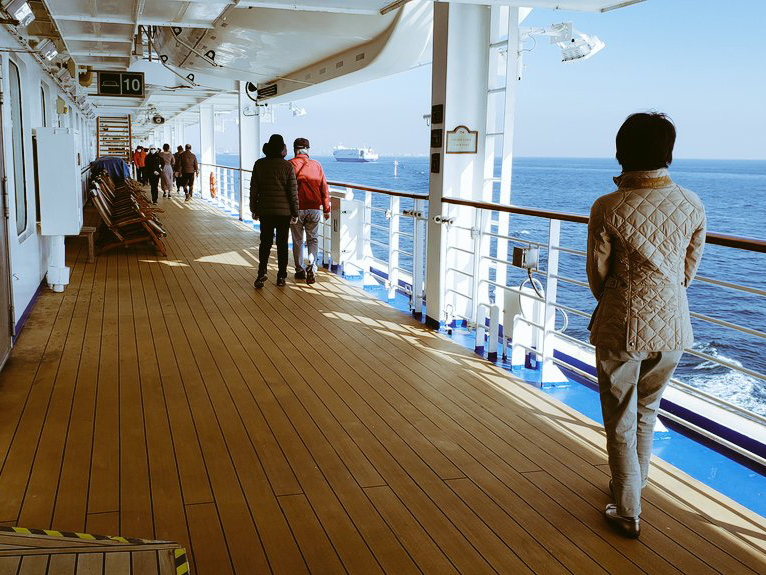 caption: Many passengers aboard the Diamond Princess cruise ship have created online groups to share news and encourage each other. And in some cases, they've formed lasting friendships.