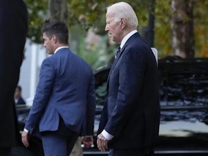 caption: President Joe Biden leaves Holy Trinity Catholic Church in the Georgetown section of Washington after attending Mass on Saturday.