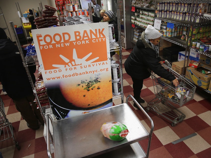 caption: The legislation includes $450 million to boost inventories at the nation's food banks, which are already hurting from increased demand.