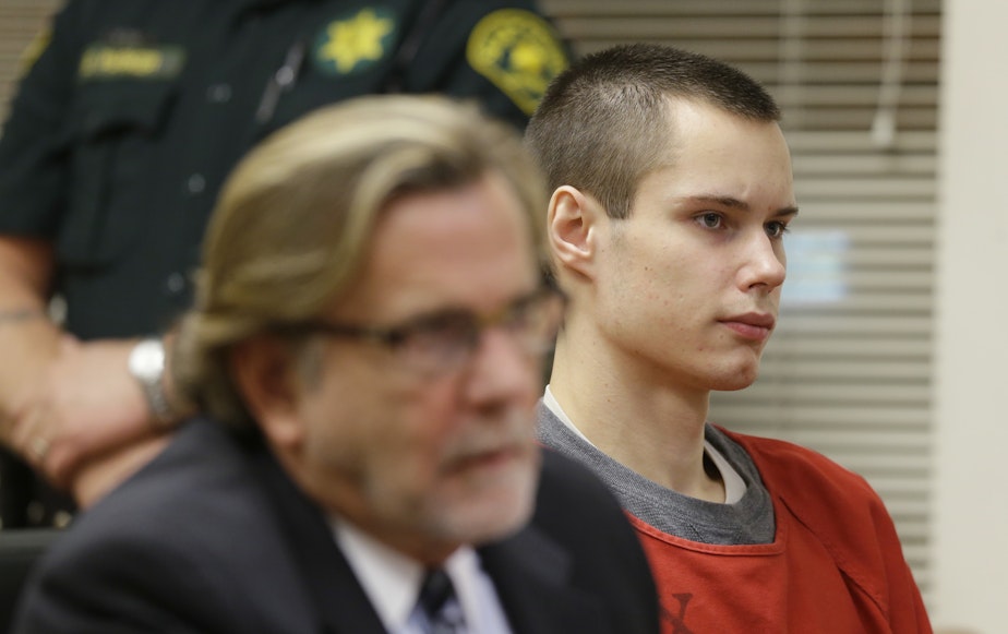 caption: FILE - In a Wednesday, May 8, 2013, file photo, Colton Harris-Moore, right, who is also known as the "Barefoot Bandit," sits in a Skagit County Superior Courtroom, in Mount Vernon, Wash., next to his attorney, John Henry Browne, left. 
