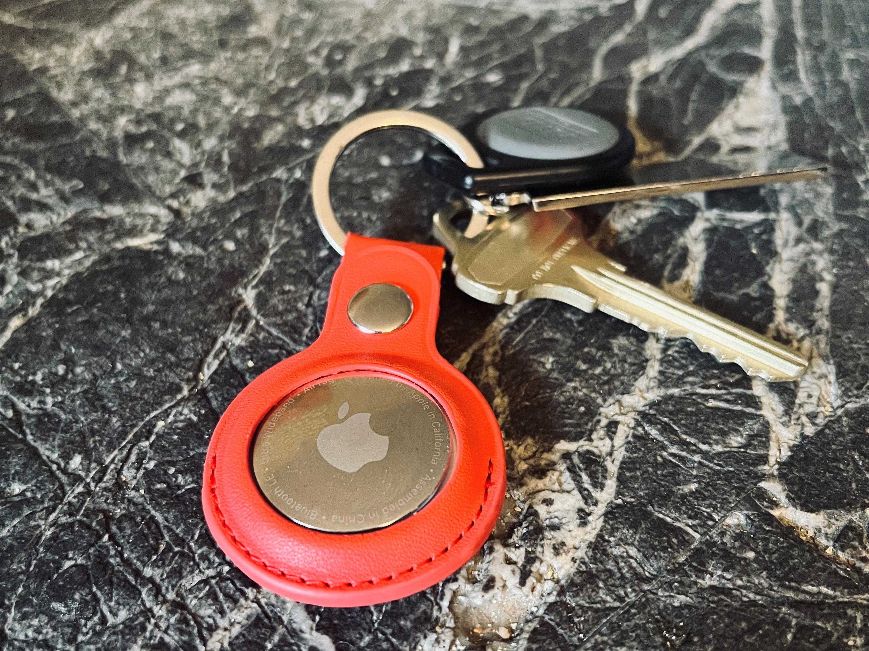 caption: Apple's AirTags help you keep track of your things, but concerns have risen over their misuse.