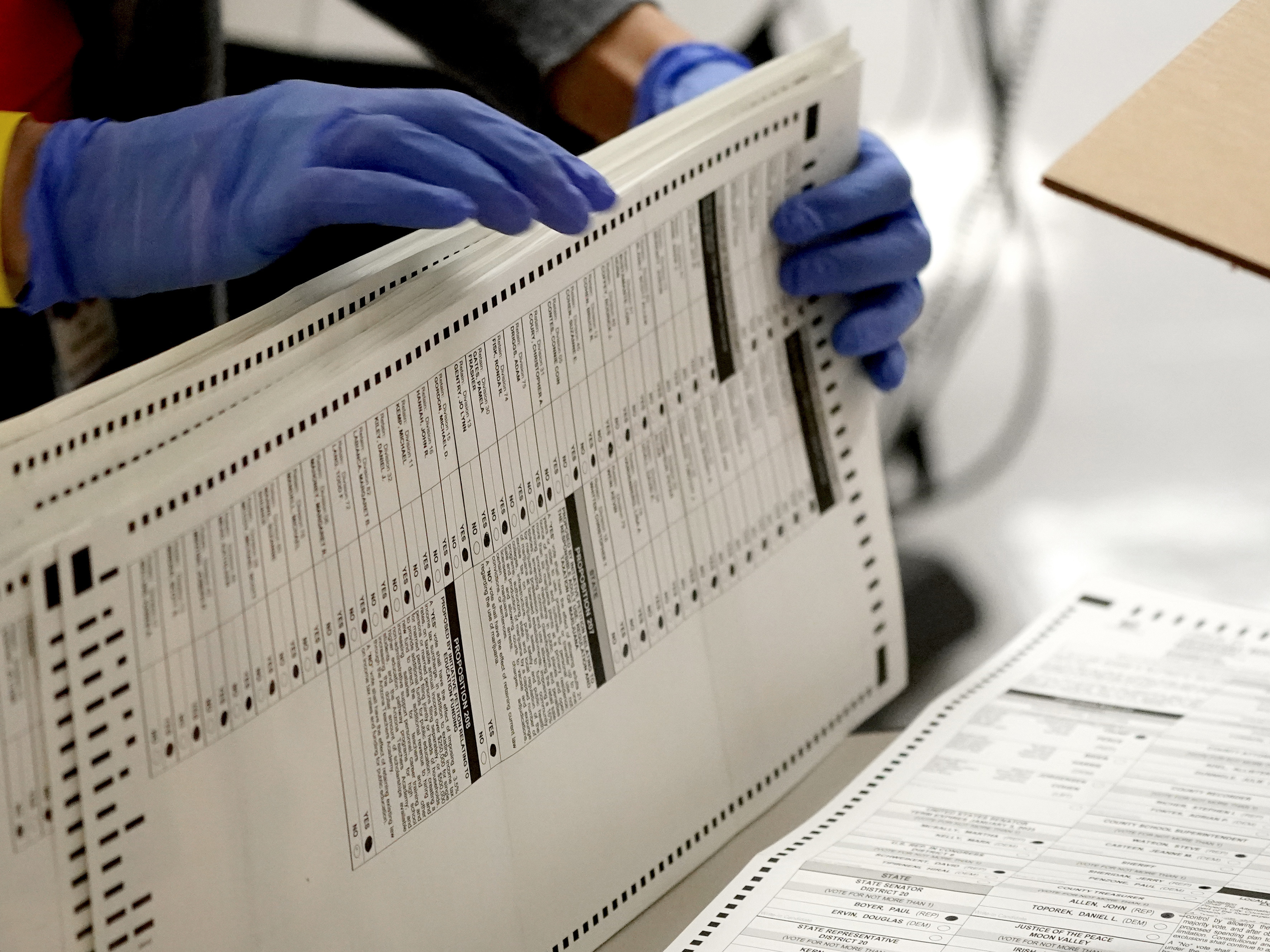 caption: Eight years after carving the heart out of a landmark voting rights law, the Supreme Court heard arguments in a case that could put new limits on efforts to combat racial discrimination in voting.