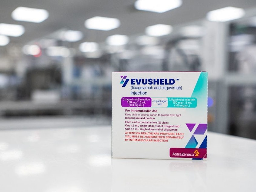 caption: A box of Evusheld, an antibody therapy developed by pharmaceutical company AstraZeneca for the prevention of COVID-19 in immunocompromised patients, is seen in February at the AstraZeneca facility for biological medicines in Sweden
