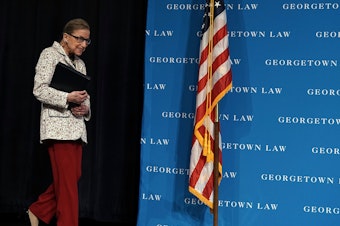 caption: U.S. Supreme Court Justice Ruth Bader Ginsburg arrives at a lecture on Sept. 26 at Georgetown University Law Center in Washington, D.C. Ginsburg has been hospitalized after falling and fracturing several ribs.