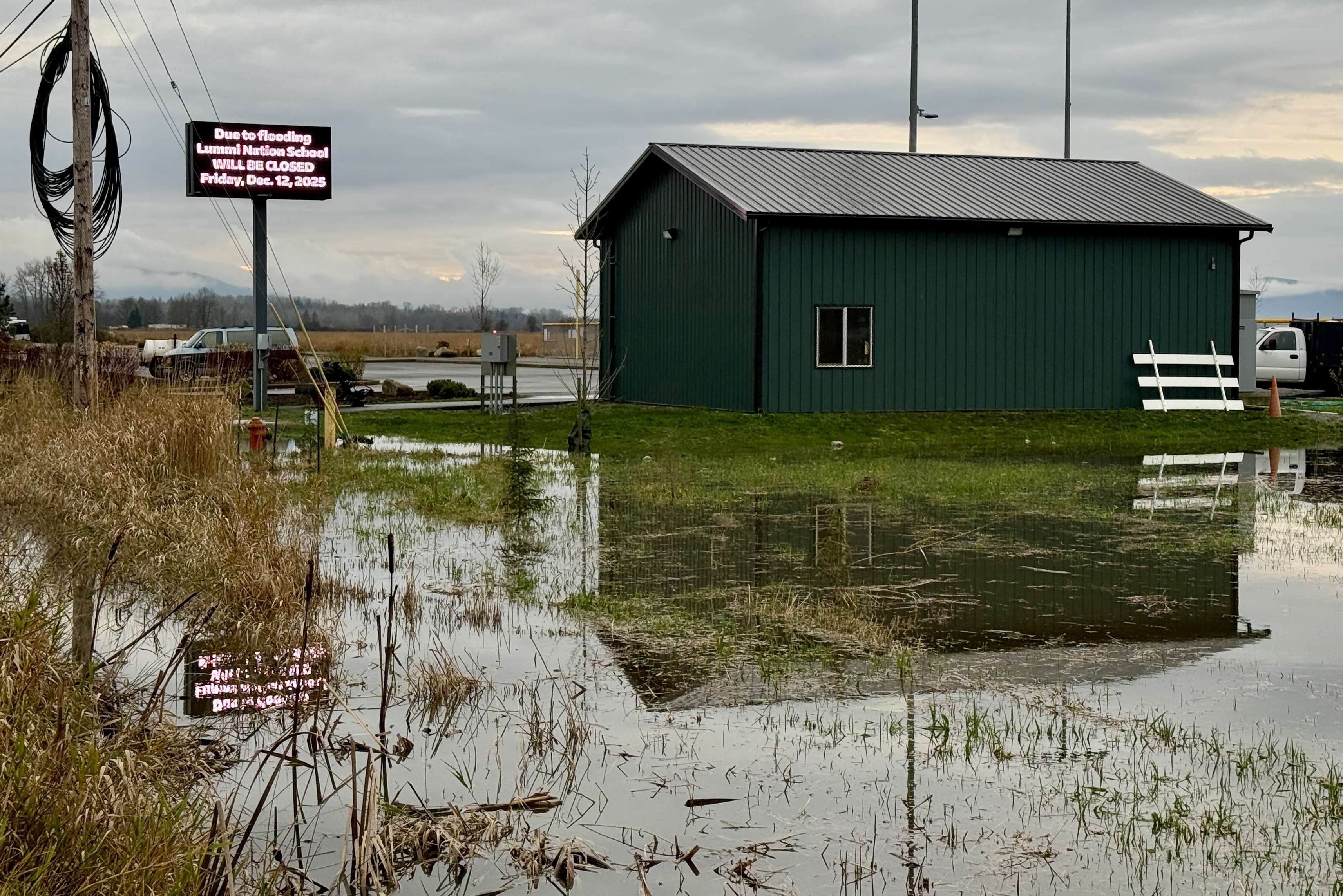 caption: Floodwaters on the Lummi Reservation near Ferndale, Washington, on Dec. 12, 2025.