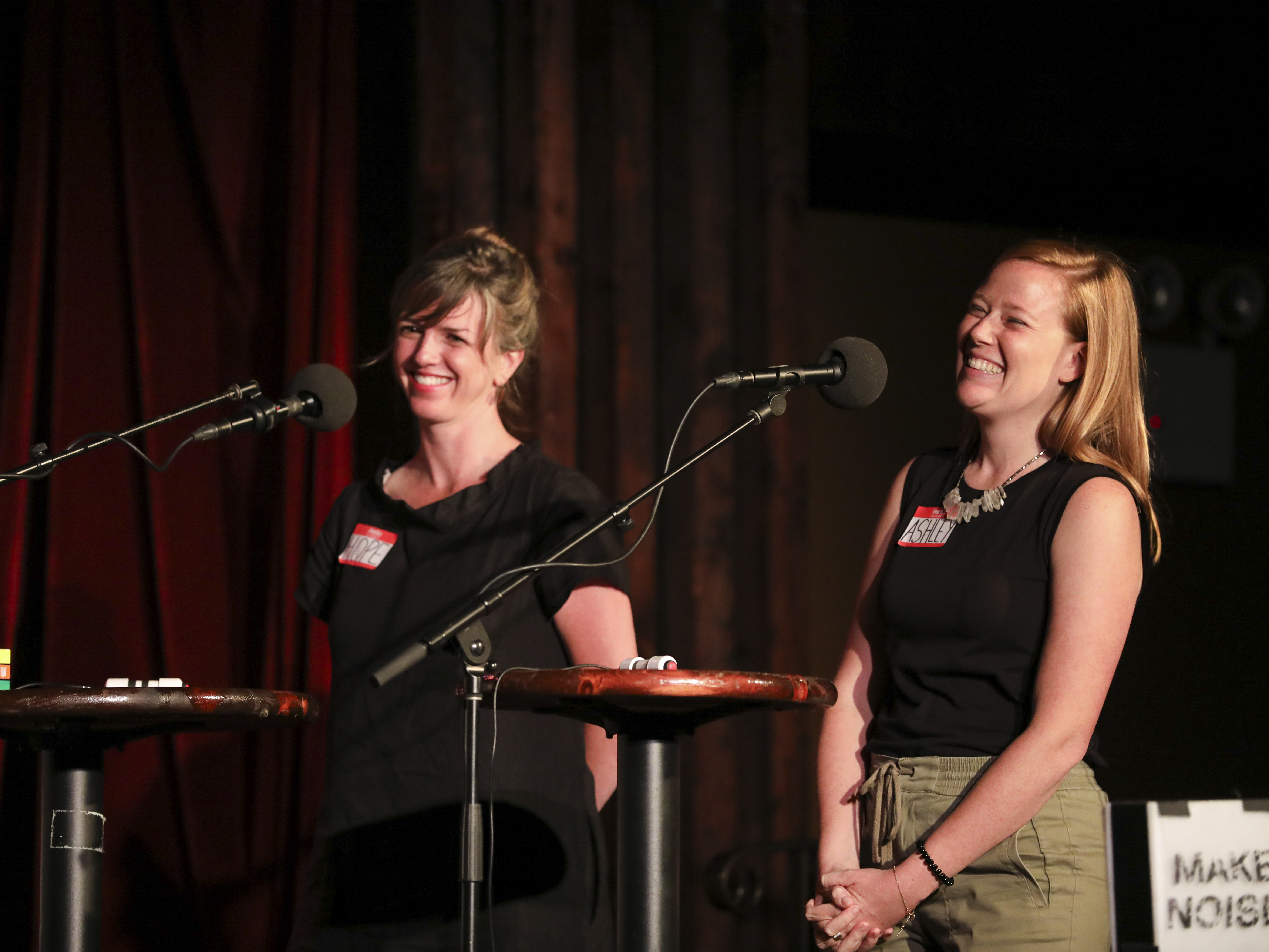 caption: Contestants compete in <em>Ask Me Another</em>'s final round at the Bell House in Brooklyn, New York.