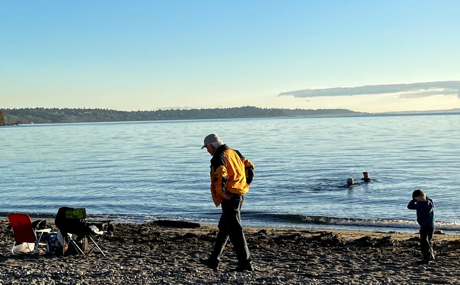 caption: In this Oct. 2020 photo, beachgoers enjoy Shoreline's Richmond Beach Saltwater Park, one of the areas closed to swimming after sewage spills in January.
