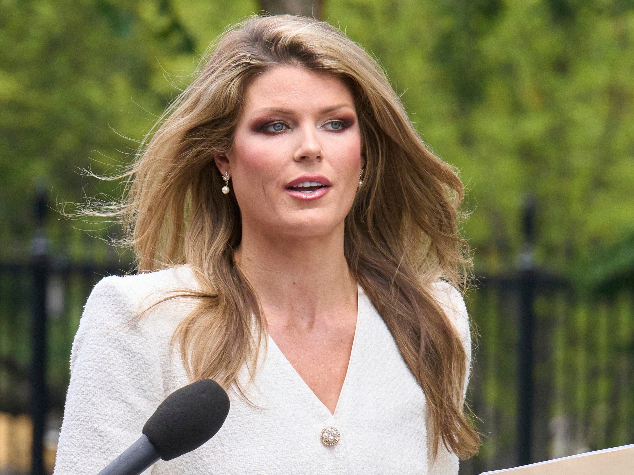 caption: Lindsey Halligan pictured outside of the White House in August, a month before she was appointed acting U.S. attorney for the Eastern District of Virginia.