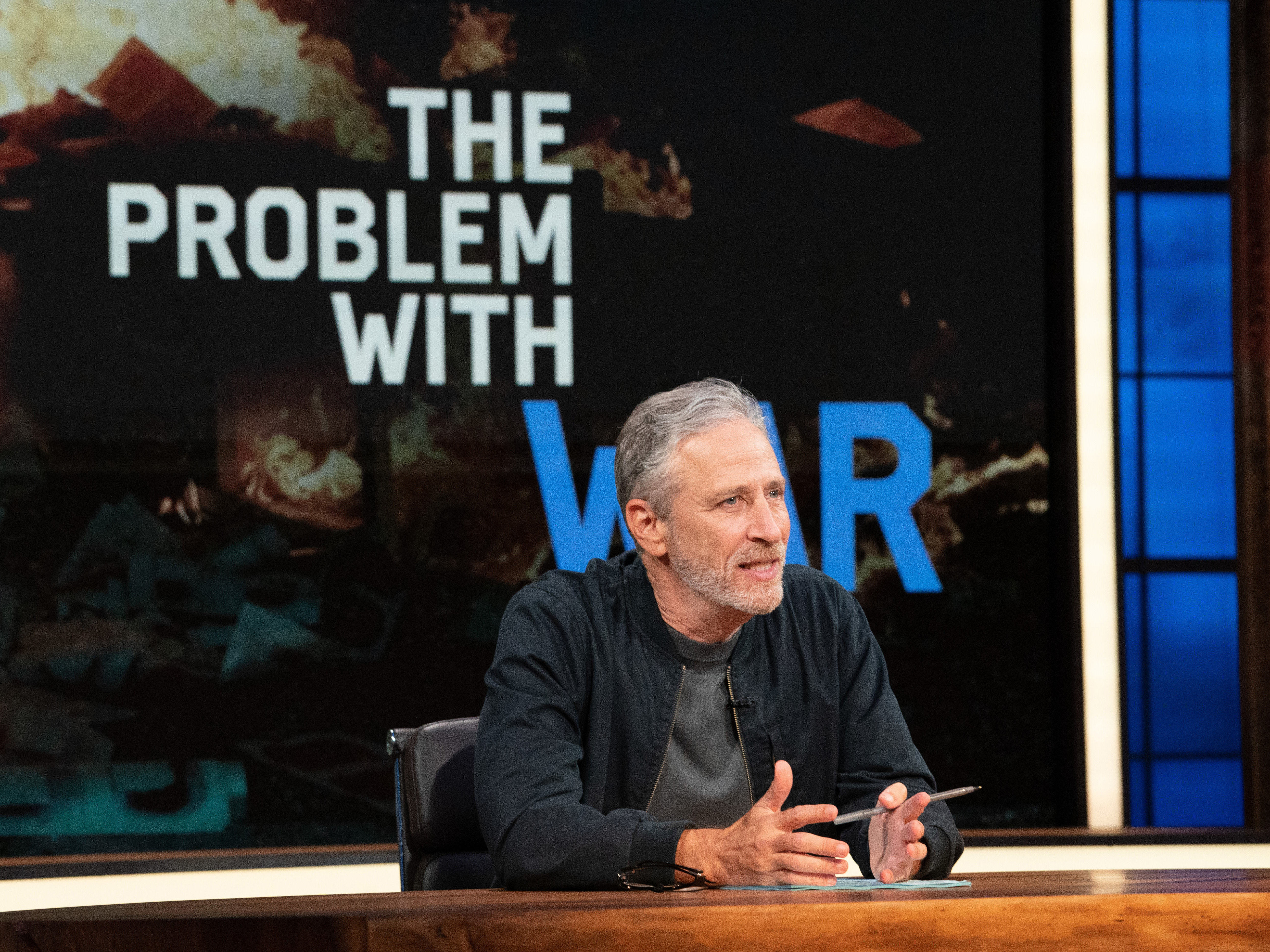 caption: Host Jon Stewart on the set of "The Problem with Jon Stewart."