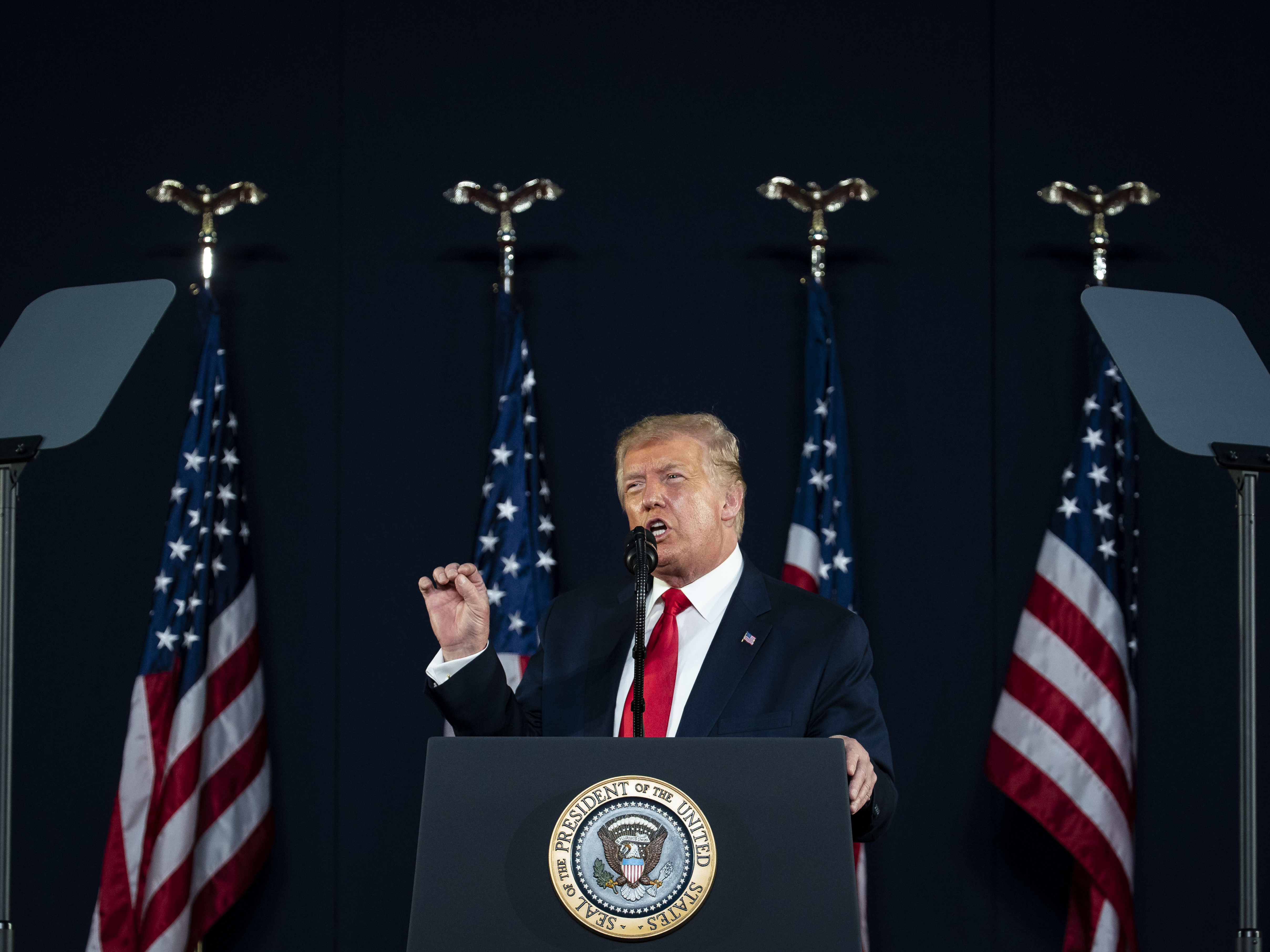 caption: President Trump speaks during an event at Mount Rushmore National Memorial in Keystone, S.D., on Friday.