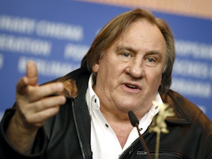 caption: Actor Gerard Depardieu addresses the media during the press conference for the film 'Saint Amour' at the 2016 Berlinale Film Festival in Berlin, Germany, Friday, Feb. 19, 2016.
